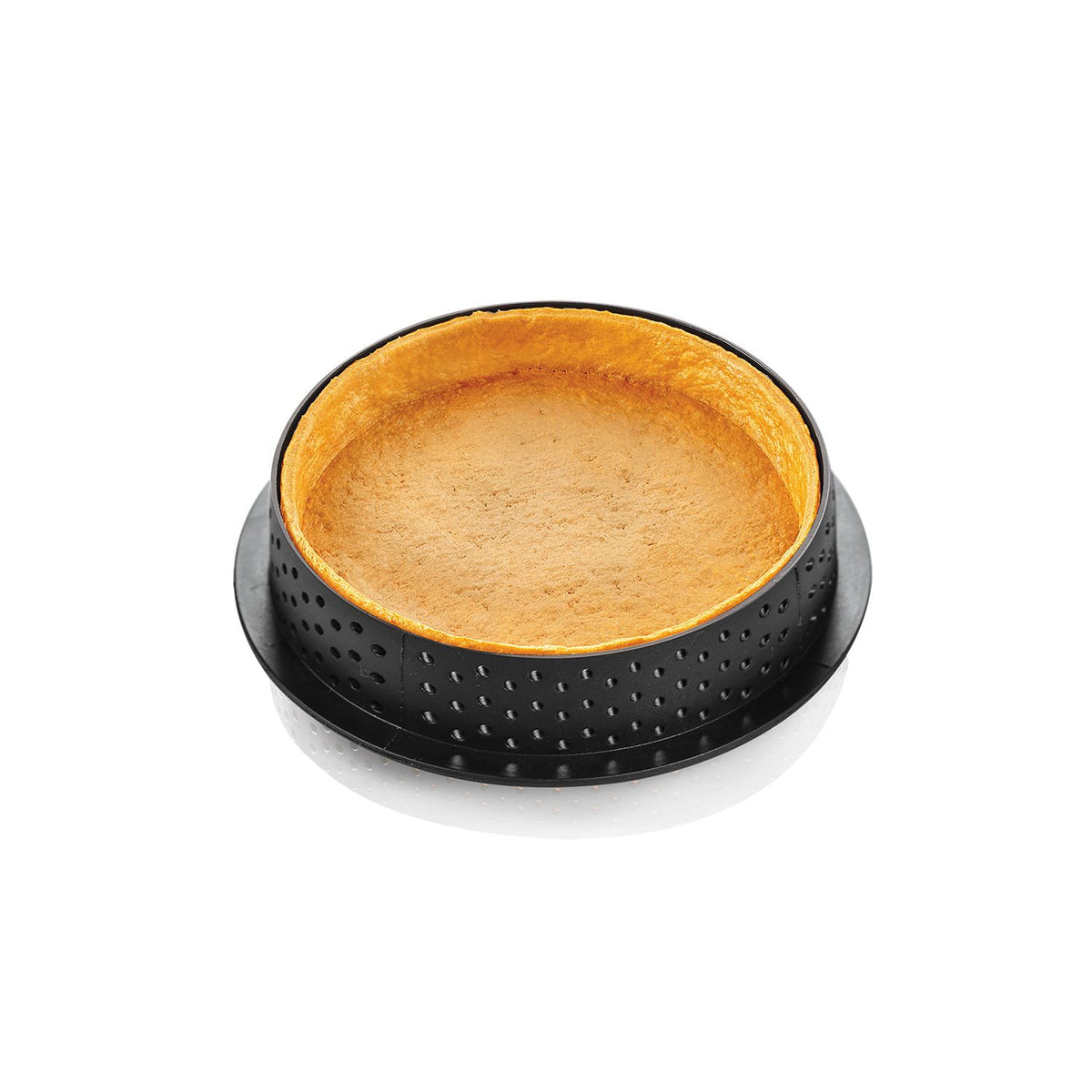 Cercle à tarte perforé rond Silikomart avec fond de tarte cuit