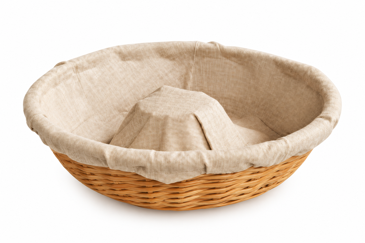 Banneton rond en osier avec toile en lin pour fermentation du pain
