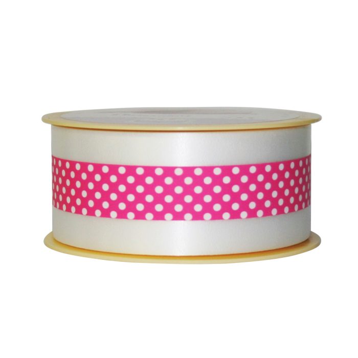 Ruban décoratif fuchsia à pois blancs sur bobine, idéal pour emballages cadeaux et décorations
