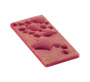 Tablette de chocolat rose décorée de cœurs