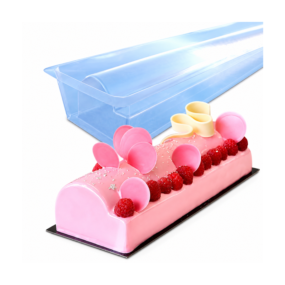 Moule à bûche de Noël Sofa transparent accompagné d'une bûche pâtissière rose décorée de framboises et de chocolat blanc.