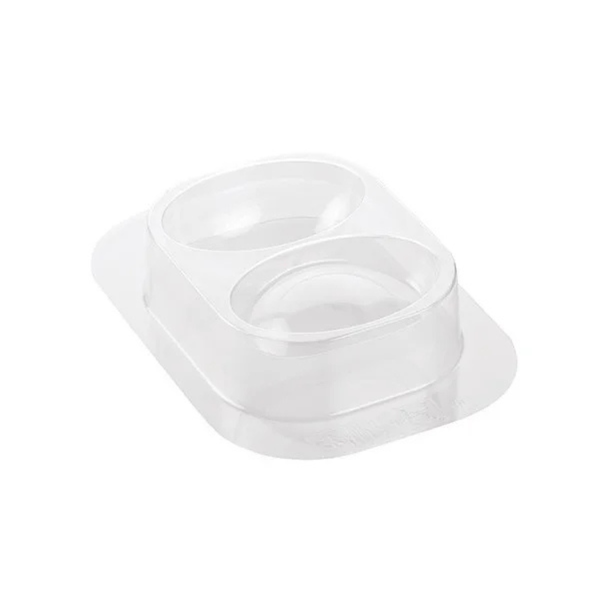 Moule transparent à deux empreintes ovales pour réaliser le museau d’un renne de Noël en chocolat.