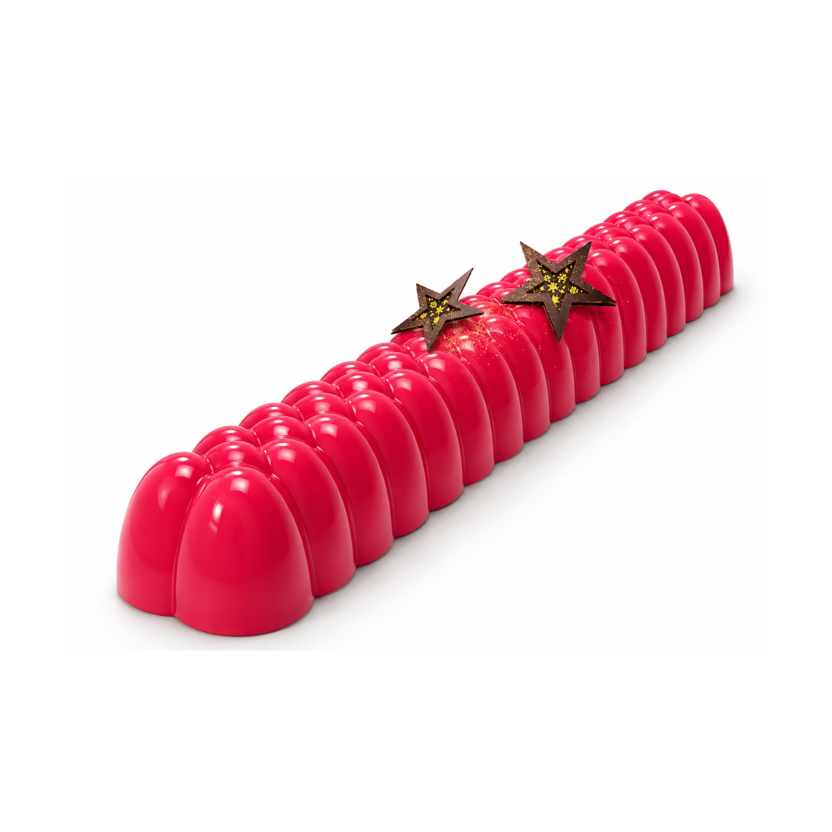 Bûche de Noël rouge au glaçage miroir brillant, avec reliefs arrondis et étoiles en chocolat noir