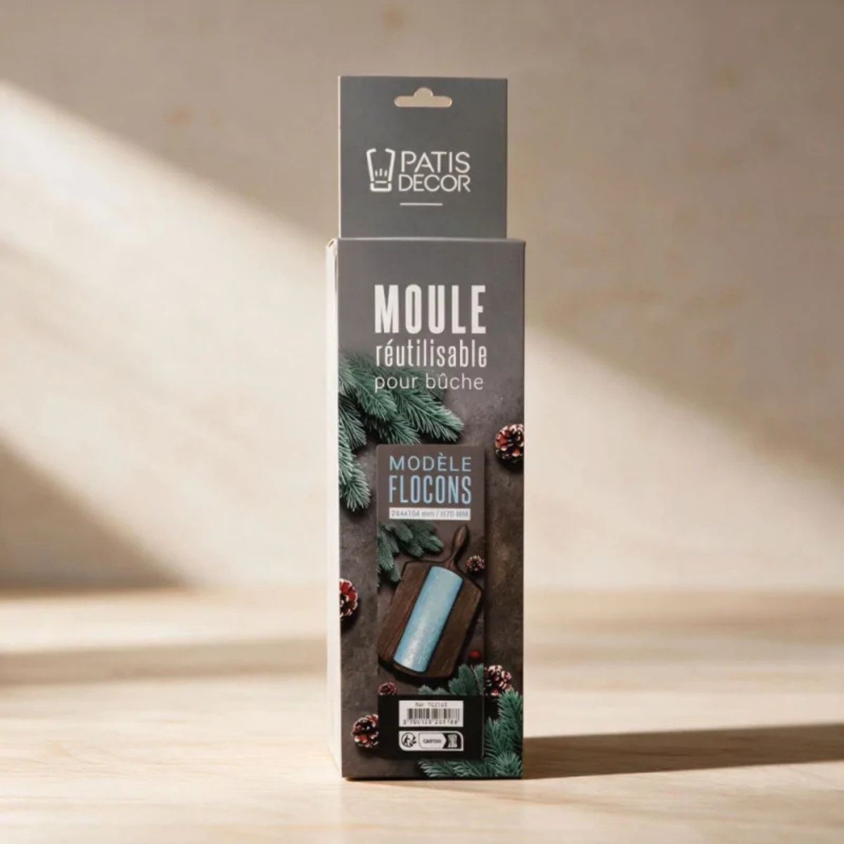 Emballage du moule à bûche de Noël Flocons réutilisable PatisDécor, avec illustration du modèle et décorations festives.